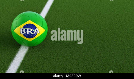 Soccer ball in brazils national colors on a soccer field. Copy space on the right side - 3D Rendering Stock Photo