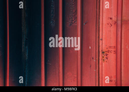 Vintage red shutter door background Stock Photo