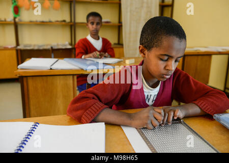 ETHIOPIA, Amhara, Gondar, school for blind children, writing braille letters / AETHIOPIEN, Amhara, Gonder, Schule fuer blinde Kinder, Blindenschrift schreiben