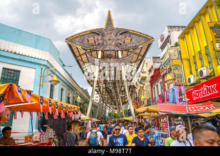 KUALA LUMPUR, MALAYSIA - FEBRUARY 19, 2018: People walking and shopping around Kasturi Walk Central Market in Kuala Lumpur Stock Photo