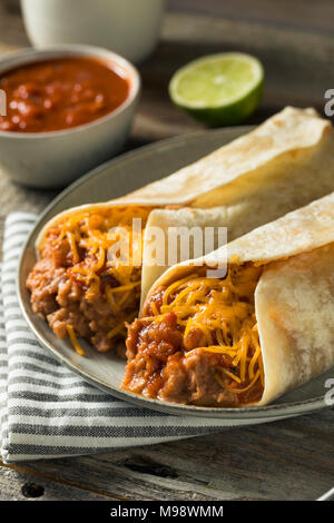 Homemade Bean and Cheese Burrito in a Tortilla Stock Photo