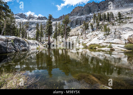 Emerald Lake is the 3rd lake seen along the Lakes Trail, a 13 mile back country  trail in Sequoia National Park. Stock Photo