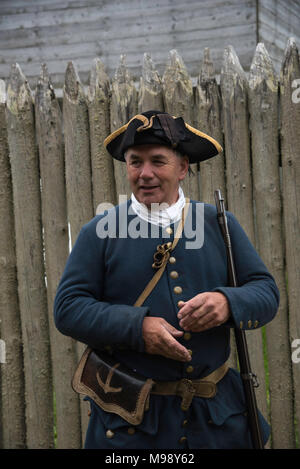 LOUISBOURG, NOVA SCOTIA CANADA - CIRCA SEPTEMBER 2016 - Authentic costumed resident of Fortress of Louisbourg National Historic Site. Stock Photo