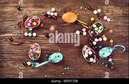 Easter eggs on rustic wooden background. Top view Stock Photo