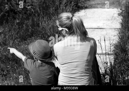 black and white photo of mother with son Stock Photo
