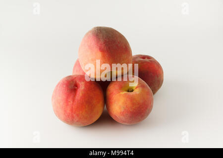 Fresh gardening peaches isolated on white background Stock Photo