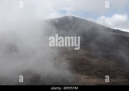 Clouds rise at the summit of the Piton de la Fournaise (La Reunion) Stock Photo