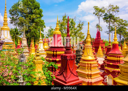 Stupa, traditional Buddhist burial gravestones at a temple in a rural area of Cambodia Stock Photo