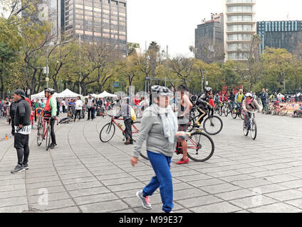 Mexico City residents take to the streets on Sunday morning along the Paseo de la Reforma, a thoroughfare closed to all but foot and bike traffic. Stock Photo