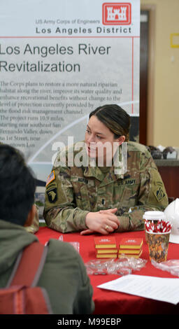 1st Lt. Kerry Horan, U.S. Army Corps of Engineers Los Angeles District, answers questions from students about her career in engineering and as an active-duty Soldier during the John Muir High School’s Engineering and Environmental Science Academy School Exploration Showcase Feb. 14 in Pasadena, California. The showcase was part of the school’s Engineer Week. Stock Photo