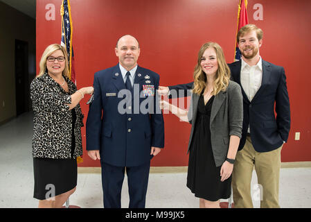 James W. Rivers, 123rd Intelligence Squadron Superintendent, and family pose during Rivers’ Chief Master Sgt. Promotion at Ebbing Air National Guard Base, Fort Smith, Ark., Feb. 24, 2018.  Rivers enlisted in the Air Force in July, 1986, and has served vital roles in the intelligence community in both Active Duty and the Air National Guard. (U.S. Air National Guard Stock Photo