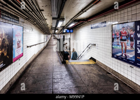 Brooklyn, USA - October 28, 2017: Empty underground transit stairs, exit transfer sign in NYC New York City Subway Station, by Brooklyn Bridge, Cadman Stock Photo