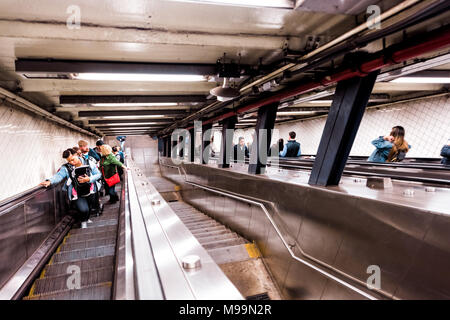 Brooklyn, USA - October 28, 2017: Underground transit escalator, stairs down in NYC New York City Subway Station, by Brooklyn Bridge, Cadman Plaza Wes Stock Photo