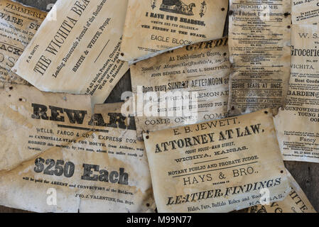 Wichita, Kansas / October 14, 2015: These old advertisements are posted at Old Cow Town, a living history museum that recreates a frontier settlement Stock Photo