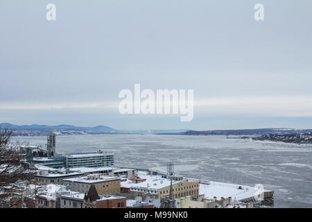 Panorama of frozen Saint Lawrence river (fleuve Saint Laurent) in Quebec city during a winter afternoon. Saint Lawrence is one of the main rivers of C Stock Photo