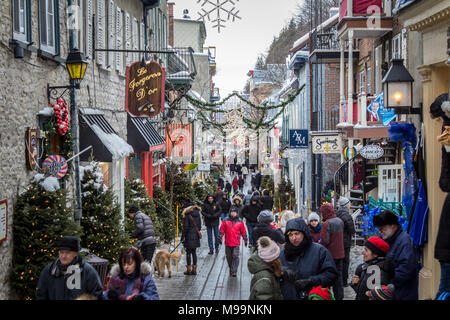 QUEBEC, CANADA - DECEMBER 26, 2016: Petit Champlain street in the old Quebec seen from above, crowded with tourists, during a winter afternoon  Pictur Stock Photo