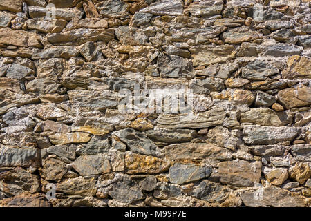 Background from the wall built from large natural stone texture Stock Photo