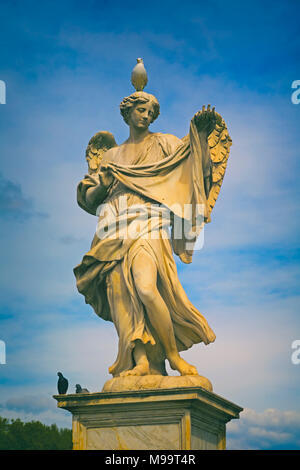 Rome, Italy.  Angel with the Sudarium or Veil of Veronica, sculpted by Cosimo Fancelli, 1620-1688, on the Pont Sant’Angelo.  The historic centre of Ro Stock Photo