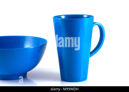 Blue disk and green cup isolate on white background Stock Photo