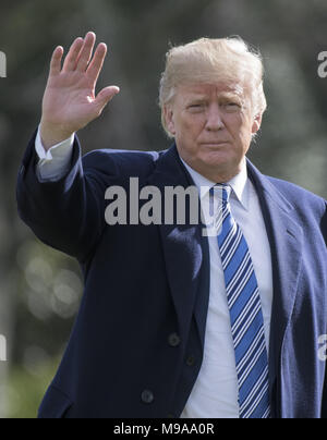 Washington, District of Columbia, USA. 23rd Mar, 2018. United States President Donald J. Trump waves to the press as he prepares to depart the White House in Washington. Credit: Ron Sachs/CNP/ZUMA Wire/Alamy Live News Stock Photo