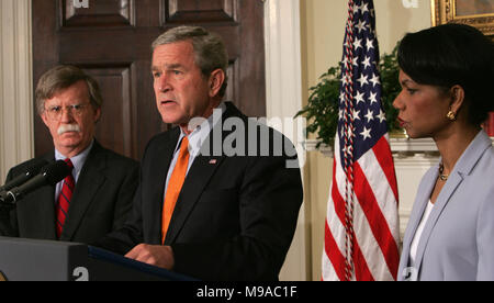 FILED - Washington, DC - August 1, 2005 -- United States President George W. Bush announces the recess appointment of John Bolton to be the United States Ambassador to the United Nations in the Roosevelt Room of the White House on August 1, 2005. left to right: John Bolton, President George W. Bush, United States Secretary of State Condoleezza Rice. Credit: Dennis Brack - Pool via CNP - NO WIRE SERVICE · Photo: Dennis Brack/Consolidated News Photos/Dennis Brack - Pool Stock Photo