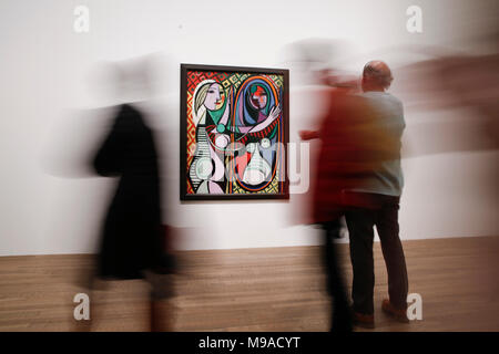 London, London, UK. 24th Mar, 2018. People visit 'The EY Exhibition Picasso 1932 - Love, Fame, Tragedy' held in Tate Modern, London, Britain on March 24, 2018. The exhibition will close on Sept. 9. Credit: Han Yan/Xinhua/Alamy Live News Stock Photo