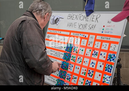 People in Shrewsbury, England, being asked about their opinion on Brexit on the future of the UK. People could place stickers on a Brexitometer board to signify their opinions on a number of matters relating the UK post Brexit. Stock Photo