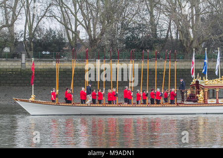 London UK. 24th March 2018. Oars are raised on the  90 foot Queens row barge  Gloriana which was used in the Diamond Jubilee Pageant as it sails into Putney at low tide before the start of the University Boat race between Cambridge and Oxford Credit: amer ghazzal/Alamy Live News Stock Photo