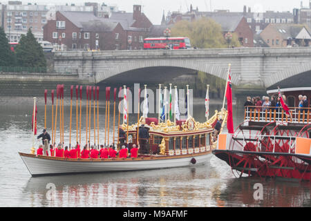 London UK. 24th March 2018. Oars are raised on the  90 foot Queens row barge  Gloriana which was used in the Diamond Jubilee Pageant as it sails into Putney at low tide before the start of the University Boat race between Cambridge and Oxford Credit: amer ghazzal/Alamy Live News Stock Photo