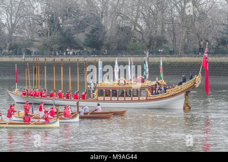 London UK. 24th March 2018. Oars are raised on the  90 foot Queens row barge  Gloriana which was used in the Diamond Jubilee Pageant as it sails into Putney at low tide before the start of the University Boat race between Cambridge and Oxford Credit: amer ghazzal/Alamy Live News Stock Photo