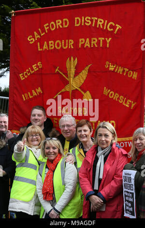 Salford, UK. 24th March, 2018. Salford District labour Party Banner propped up behind campaigners, Swinton, Salford, 24th March, 2018 (C)Barbara Cook/Alamy Live News Stock Photo