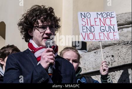 Munich, Bavaria, Germany. 24th Mar, 2018. Youth speaker Patrick Oberlaender (20). Joining some 838 events worldwide, over 350 expatriates in Munich, Germany held their own March For Our Lives demonstration in response to the activism sparked by the mass shooting at the Marjory Stoneman Douglas High School. The latest shooting and subsequent activism has put students and gun control advocates on a direct course against the National Rifle Association (NRA) who has in turn stepped up their lobbying and PR-offensives. One of the guest speakers was Pam Feldmann, the mother of a student at Parkl Cre Stock Photo