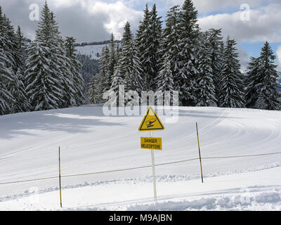 The busy ski resort of Chatel in the Portes du Soleil area of France and the helicopter landing zone Stock Photo