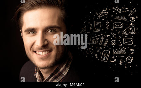 A successful confident businessman near graph pie charts and calculations concept Stock Photo