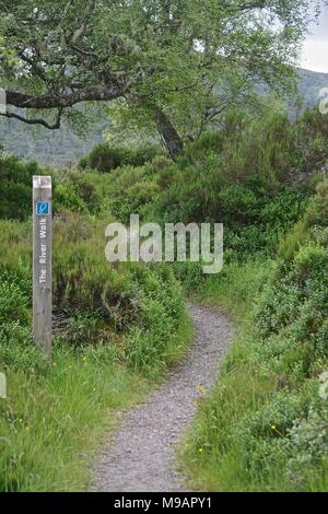 Trail marker at Glen Affric, described as the most beautiful glen in Scotland. River Affric runs through it, connecting Loch Affric and Loch Benevean. Stock Photo