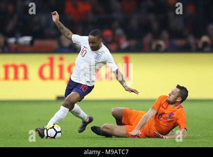 England's Raheem Sterling (left) and Netherland's Stefan de Vrij battle for the ball Stock Photo