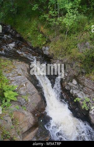 Overhead view of Plodda Falls, a popular tourist attraction located south-west of the village of Tomich, near Glen Affric, in the Scottish Highlands. Stock Photo