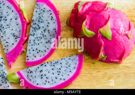 Pitaya Fruit slices on wood Stock Photo