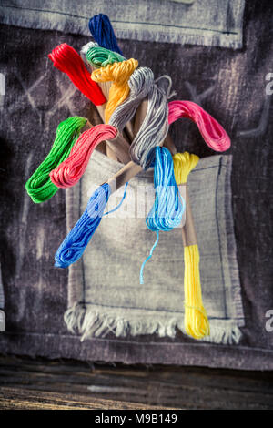 Closeup of colored threads in tailor workshop Stock Photo
