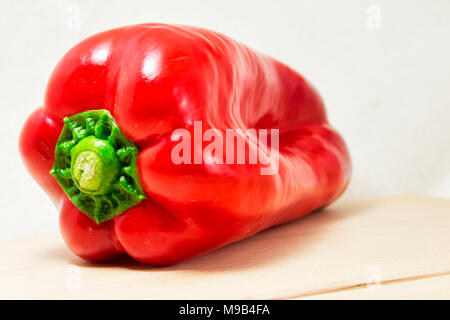 soft focus of a fresh red pepper on a white background - Capsicum, solanaceae Stock Photo