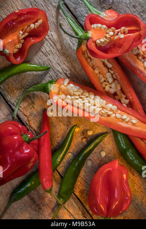 Hot and spicy chili peppers - jalapeno and habanero peppers. Stock Photo