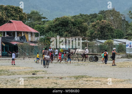 Capurgana, Colombia - march 2018: Kids playing soccer in the streets of  Capurgana, Colombia Stock Photo