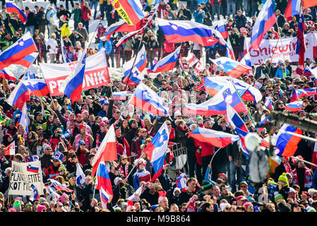 Planica, Slovenia. 24th Mar, 2018. Spectators cheering and watching competition of FIS Ski Jumping World Cup finals in Planica, Slovenia on March 24, 2017. Credit: Rok Rakun/Pacific Press/Alamy Live News Stock Photo