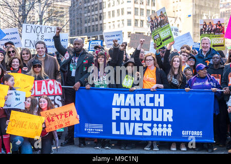 New York, USA. 24 March 2018. New York Governor  Andrew Cuomo (L) , Black Lives Matter President Hawk Newsome (2L) and NY Mayor Bill De Blasio (R) join a 'March For Our Lives' protest demanding gun control in New York City. Photo by  Enrique Shore/Alamy Live News Stock Photo