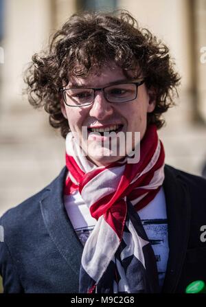 Munich, Bavaria, Germany. 24th Mar, 2018. Youth speaker Patrick Oberlaender (20). Joining some 838 events worldwide, over 350 expatriates in Munich, Germany held their own March For Our Lives demonstration in response to the activism sparked by the mass shooting at the Marjory Stoneman Douglas High School. The latest shooting and subsequent activism has put students and gun control advocates on a direct course against the National Rifle Association (NRA) who has in turn stepped up their lobbying and PR-offensives. One of the guest speakers was Pam Feldmann, the mother of a student at Parkl Stock Photo