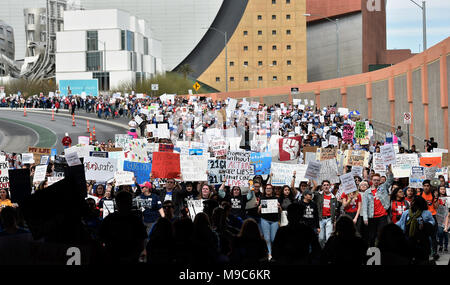 Las Vegas, Nevada, USA. 24th Mar, 2018. People rally during the March for Our Lives demonstration. Hundreds of thousands of protesters, including students, teachers, and parents are expected to gather across the country for anti-gun violence rallies, spurred largely by the shooting that took place on Valentine's Day at Marjory Stoneman Douglas High School in Parkland, Florida where 17 people died. Credit: David Becker/ZUMA Wire/Alamy Live News Stock Photo