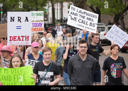Nearly 10,000 marchers converge in downtown Austin at the State Capitol during the March For Our Lives, protesting gun violence in the wake of school mass shootings. Stock Photo