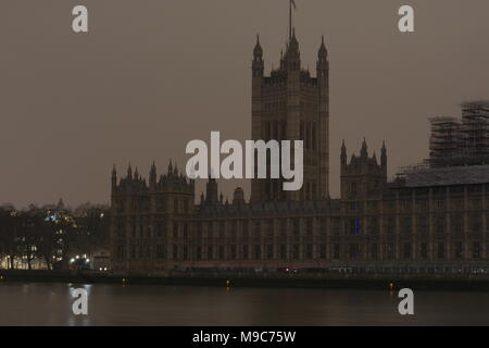 London, UK, 24 Mar 2018. Photograph of The Palace of Westminster / The Houses of Parliament with the lights turned out for Earth Day 2018 Stock Photo