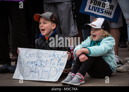 Reno, Nevada, USA. 24th Mar, 2018. CONNOR, left, age 8, and his sister, HAILEY ANNIS, age 5, participate in the March for Our Lives event in Reno, Nevada, on Saturday, March 24, 2018. The children's mother, Megan, said she and her children were at the day's event because, ''I want my children to go to school and not be afraid. Credit: Tracy Barbutes/ZUMA Wire/Alamy Live News Stock Photo