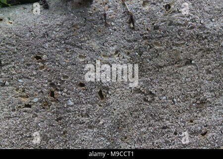 Rough split face stone texture. Rocks grange background for web site or mobile devices Stock Photo